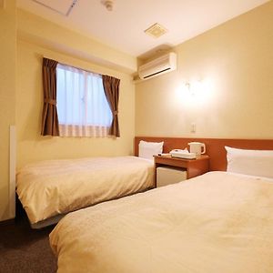 Economy Kamer met Twee Aparte Bedden